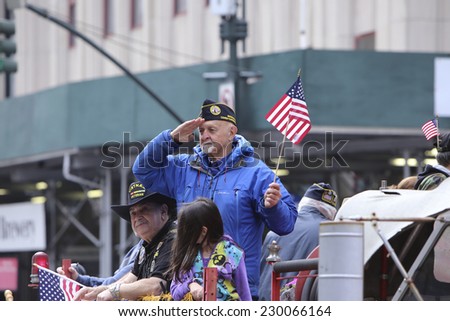 NEW YORK CITY - NOVEMBER 11 2014: the 95th annual Veteran's Day parade along Fifth Avenue is the largest Nov 11 celebration in the United States.