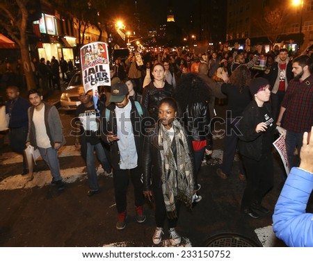 NEW YORK CITY - NOVEMBER 25 2014: several hundred gathered at Union Square to await announcement of the Ferguson grand jury's verdict in the death of Michael Brown followed by a march to Times Square