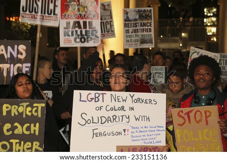 NEW YORK CITY - NOVEMBER 25 2014: several hundred gathered at Union Square to await announcement of the Ferguson grand jury\'s verdict in the death of Michael Brown followed by a march to Times Square