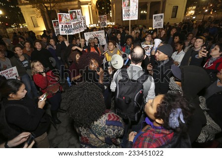 NEW YORK CITY - NOVEMBER 24 2014: after a rally awaiting announcement of the Ferguson grand jury's failure to indict Darren Wilson in the death of Michael Brown, activists took to the streets of NYC