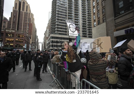 NEW YORK CITY - NOVEMBER 27 2014: Ferguson protesters attempted to block Macy's Thanksgiving Day parade in reaction to the grand jury's failure to indict Darren Wilson. NYPD made several arrests