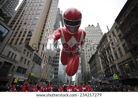 NEW YORK CITY - NOVEMBER 27 2014: the 88th annual Macy\'s Thanksgiving Day parade stretched from Manhattan\'s Upper West Side to Herald Square, viewed by 350,000 spectators. Mighty Morphin Power Ranger