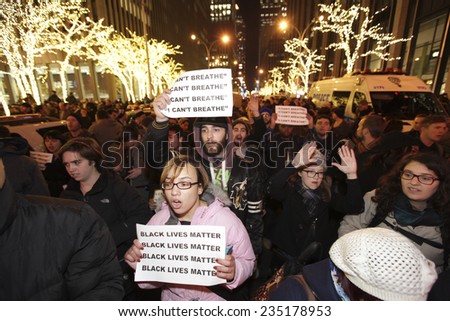 NEW YORK CITY - DECEMBER 3 2014:thousands of activists filled the streets of Manhattan after it was announced that the grand jury failed to indict NYPD officer Joe Pantaleo in the death of Eric Garner