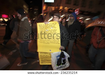 NEW YORK CITY - DECEMBER 7 2014: several hundred activists gathered at Union Square for a fifth night of marching & demonstration against a grand jury\'s failure to indict in the death of Eric Garner
