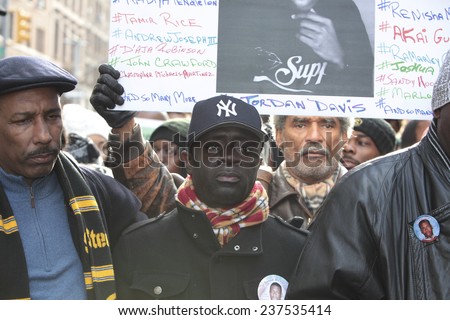 NEW YORK CITY - DECEMBER 13 2014: thousands filled the streets of Lower Manhattan in the Million March NYC to protest police brutality & the lack of organizational accountability. Franclot Graham,
