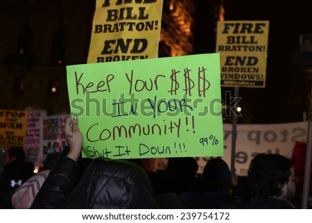 NEW YORK CITY - DECEMBER 23 2014: several hundred demonstrators gathered on Fifth Avenue for a march & protest against police brutality & lack of accountability in the death of Eric Garner & others