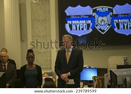 NEW YORK CITY - DECEMBER 23 2014: Mayor Bill De Blasio led City Hall staffers in a moment of silence in memory of slain NYPD officers Wenjin Liu & Rafael Ramos in the city hall \