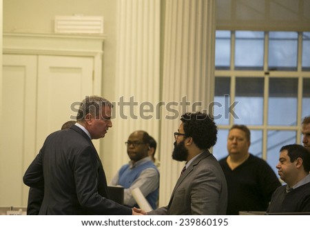 NEW YORK CITY - DECEMBER 23 2014: Mayor Bill De Blasio presided over a moment of silence in memory of slain NYPD officer Rafael Ramos & Wenjin Liu in the City Hall \