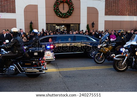 NEW YORK CITY - DECEMBER 27 2014: along with political leaders, uniformed police officers from all over north America attended funeral services for slain NYPD officer Rafael Ramos