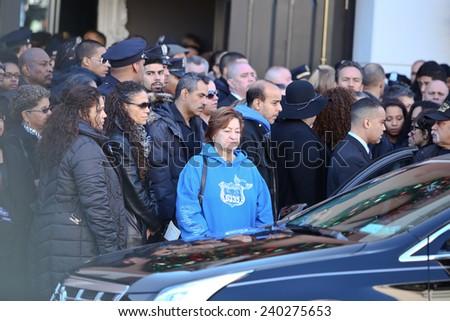 NEW YORK CITY - DECEMBER 27 2014: along with political leaders, uniformed police officers from all over north America attended funeral services for slain NYPD officer Rafael Ramos