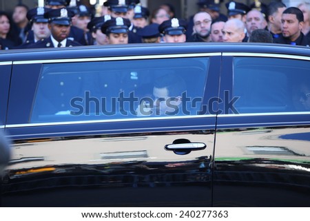 NEW YORK CITY - DECEMBER 27 2014: along with political leaders, uniformed police officers from all over north America attended funeral services for officer Rafael Ramos. Sons Justin & Jared Ramos
