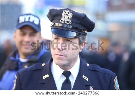 NEW YORK CITY - DECEMBER 27 2014: along with political leaders, uniformed police officers from all over north America attended funeral services for NYPD officer Rafael Ramos. PBA head Patrick Lynch