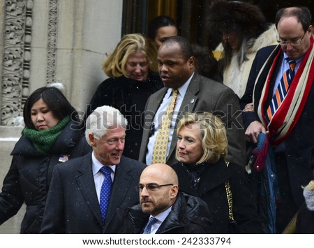 NEW YORK CITY - JANUARY 6 2015: funeral services were held for former New York governor Mario Cuomo at St. Ignatius Loyola Church on Manhattan\'s Upper East Side. Bill & Hillary Rodham Clinton.