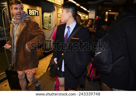 NEW YORK CITY - JANUARY 11 2015: Improv Everywhere staged its 14th annual No Pants Subway Ride bringing several hundred \