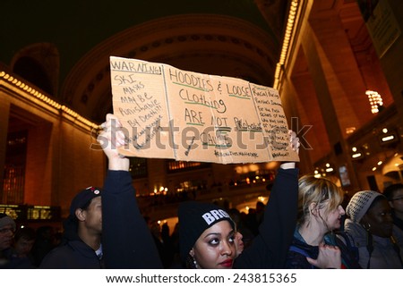 NEW YORK CITY - JANUARY 12 2015: Led by the Bronx Cop Watch, several dozen protesters gathered in Grand Central Terminal to protest against alleged acts of police brutality & lack of accountability
