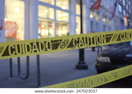 NEW YORK CITY - JANUARY 25 2015: a shooting at the Home Depot store in Chelsea left two employees dead in what is being called a murder-suicide. Crime scene tape cordoning off sidewalk