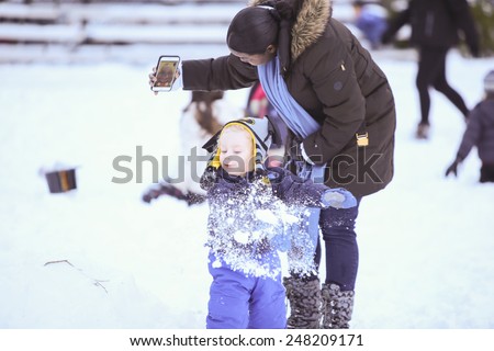 NEW YORK CITY - JANUARY 28 2015: Asphalt Green, a non-profit center on Manhattan\'s Upper East Side, sponsored its annual Snowman Showdown on the football fields of its 90th Street campus.