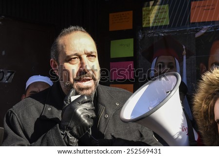 NEW YORK CITY - FEBRUARY 13 2015: Members of the Muslim community staged a vigil to call for justice in the killing of three Muslim Chapel Hill students. Christian minister addresses rally