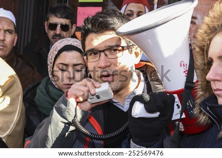NEW YORK CITY - FEBRUARY 13 2015: Members of the Muslim community staged a vigil to call for justice in the killing of three Muslim Chapel Hill students. NYCC member for Sunset Park Carlos Menchaca