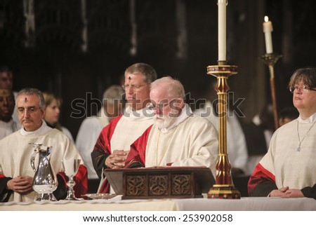 NEW YORK CITY - FEBRUARY 18 2015: Ash Wednesday was celebrated at Trinity Church with a mass conducted by Bishop Andrew Dietsche followed by \