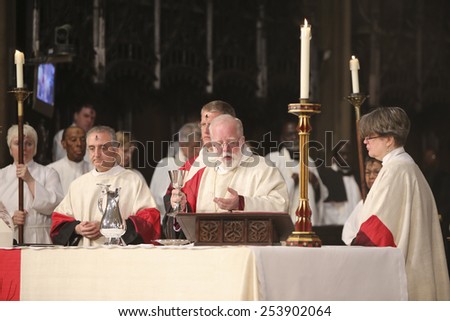 NEW YORK CITY - FEBRUARY 18 2015:Ash Wednesday was celebrated at Trinity Church with a mass conducted by Bishop Andrew Dietsche followed by 