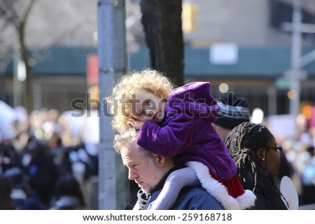 NEW YORK CITY - MARCH 8 2015: United Nations International Women's Day was marked with a rally in Dag Hammarskjold Plaza & march to Times Square.