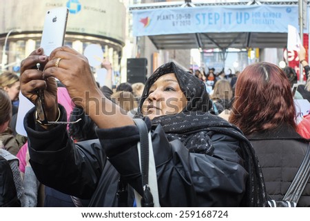 NEW YORK CITY - MARCH 8 2015: United Nations International Women\'s Day was marked with a rally in Dag Hammarskjold Plaza & march to Times Square.