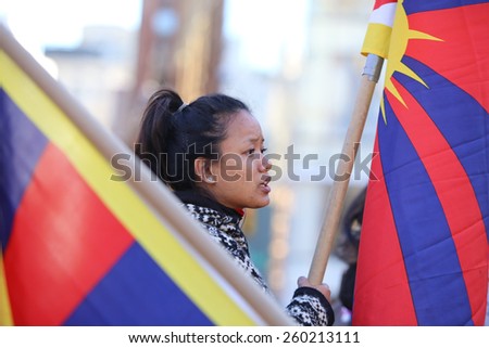 NEW YORK CITY - MARCH 12 2015: the Tibetan Women\'s Association staged a rally in Union Square Park to commemorate the 56th anniversary of the Tibetan Women\'s National Uprising Day against Chinese rule