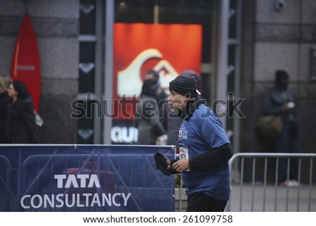 NEW YORK CITY - MARCH 15 2015: the New York Road Runners held its annual Half Marathon that started on the Upper East Side, passed through Times Square & culminated on Wall Street