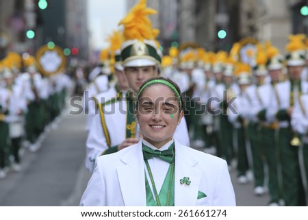NEW YORK CITY - MARCH 17 2015: the 254th St. Patrick's Day parade, led by grand marshal Timothy Cardinal Dolan, filled Fifth Avenue in Midtown in spite of protests from the Irish Queers organization