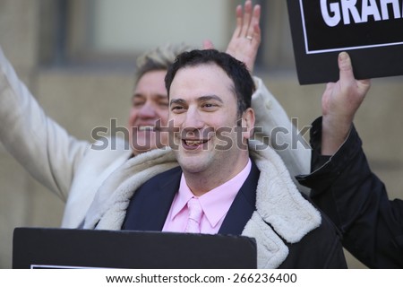 NEW YORK CITY - APRIL 1 2015: Rev Billy, Bill Talen, of the Stop Shopping Gospel Choir, celebrated the dismissal of charges against him with choir members & attorneys at 100 Centre St
