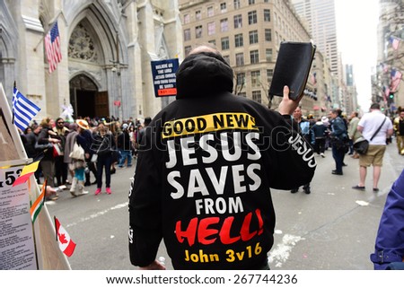 NEW YORK CITY - APRIL 5 2015: thousands of New Yorkers filled 5th Avenue marking Easter Sunday with the tradition Easter Bonnet Parade, a tradition dating from the 1870s. Christian evangelists
