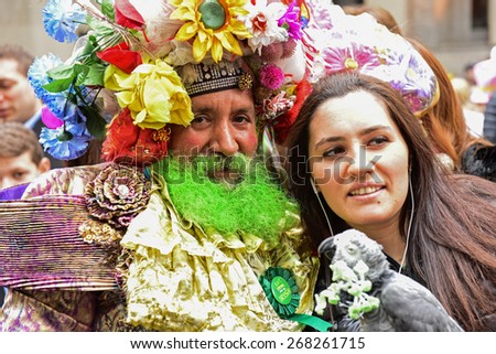 NEW YORK CITY - APRIL 5 2015: : thousands of New Yorkers filled 5th Avenue marking Easter Sunday with the tradition Easter Bonnet Parade, a tradition dating from the 1870s. Oswaldo Gomez with Rosita