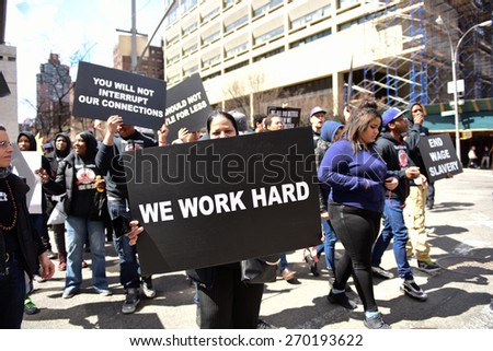NEW YORK CITY - APRIL 15 2015: high school students, union activists & fast food workers marched in Manhattan\'s Upper West Side to demand a $15 per hour federal minimum wage.