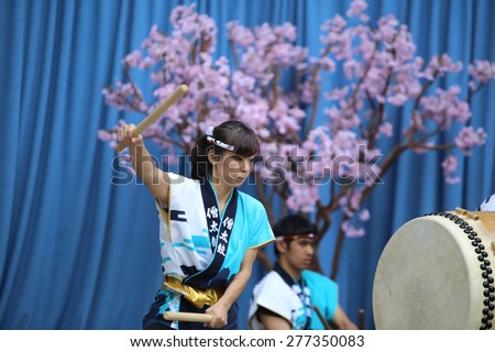 NEW YORK CITY - MAY 10 2015: the ninth annual Japan Day was celebrated in Central Park with displays of swordsmanship, folk-dance, music, Japanese food, calligraphy & kabuki face-painting