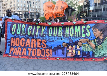 NEW YORK CITY - MAY 14 2015: several thousand tenants along with city council & state assembly members staged a march across the Brooklyn Bridge for affordable housing.