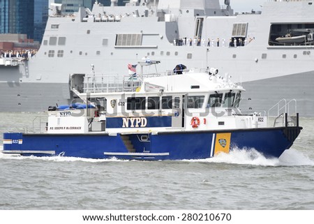 NEW YORK CITY - MAY 20 2015: the 27th annual Fleet Week NYC opened with a Parade of Ships along the Hudson River to Pier 92. NYPD patrol boat on the Hudson River