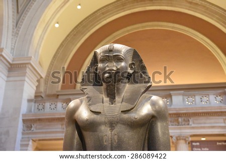 NEW YORK CITY - JUNE 9 2015: the 37th annual Museum Mile festival opened Fifth Avenue\'s Museum Mile to pedestrians and permitted visitors to enter museums free. Egyptian sculpture at the Met Museum