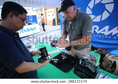 NEW YORK CITY - JUNE 14 2015: landmark NYC camera & tech store Adorama hosted its annual Family Fun Day on 18th St, permitting camera & tech vendors the opportunity to display their newest products