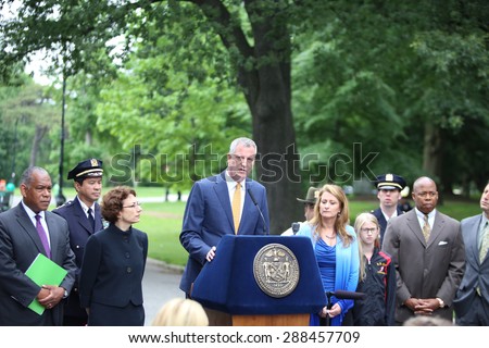NEW YORK CITY - JUNE 18 2015: Mayor Bill de Blasio held a press conference in Prospect Park, attended by city officials, to announce the  restriction of vehicular traffic in Prospect & Central Parks