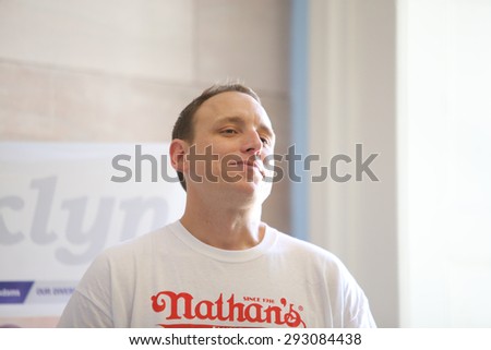 NEW YORK CITY - JULY 3 2015: contestants participating in Nathan\'s Famous July 4th hot dog eating contest gathered at Brooklyn\'s borough hall for weigh in presided over by Eric Adams & George Shea