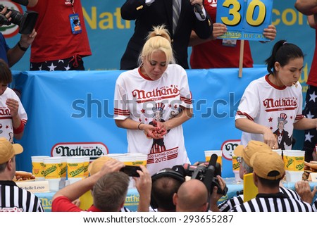 NEW YORK CITY - JULY 4 2015: Nathan\'s Famous staged its annual fourth of July hot dog eating contest in Coney Island, Brooklyn. Women\'s division competitors