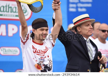 NEW YORK CITY - JULY 4 2015: Nathan\'s Famous held its annual fourth of July hot dog eating contest in Coney Island, Brooklyn. Matt Stonie declared winner after consuming 62 hot dogs