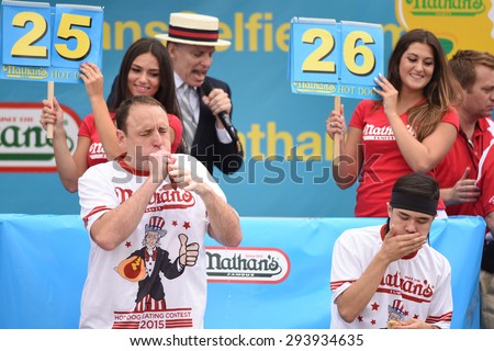 NEW YORK CITY - JULY 4 2015: Nathan\'s Famous held its annual fourth of July hot dog eating contest in Coney Island, Brooklyn. Joey Chestnut & Matt Stonie compete