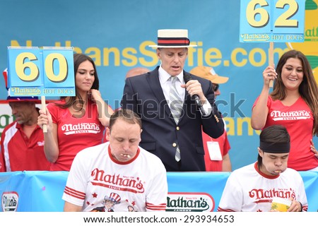 NEW YORK CITY - JULY 4 2015: Nathan\'s Famous held its annual fourth of July hot dog eating contest in Coney Island, Brooklyn. Matt Stonie & Joey Chestnut compete