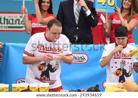 NEW YORK CITY - JULY 4 2015: Nathan\'s Famous held its annual fourth of July hot dog eating contest in Coney Island, Brooklyn. Matt Stonie & Joey Chestnut compete head to head
