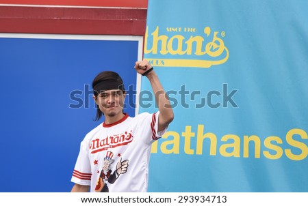 NEW YORK CITY - JULY 4 2015: Nathan\'s Famous held its annual fourth of July hot dog eating contest in Coney Island, Brooklyn. Challenger Matt Stonie introduced to the audience