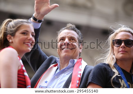 NEW YORK CITY - JULY 11 2015: a ticker tape parade was held for the champion US women\'s FIFA team along Canyon of Heroes on Broadway. Governor Andrew Cuomo rides with women\'s team players
