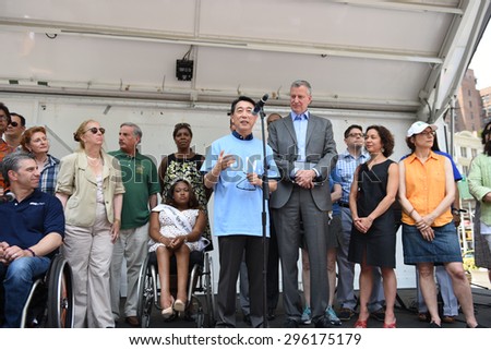 NEW YORK CITY - JULY 12 2015: Mayor Bill de Blasio & former US senator Tom Harkin led the first ever NYC Disability Pride Parade from Madison Square Park to Union Square. Oh Joon, Korean ambassador