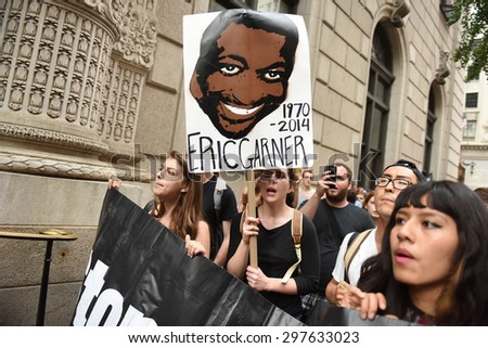NEW YORK CITY - JULY 17 2015: Million March NYC staged a rally at Columbus Circle & march to commemorate the one year anniversary of Eric Garner\'s death. Several arrests ensued